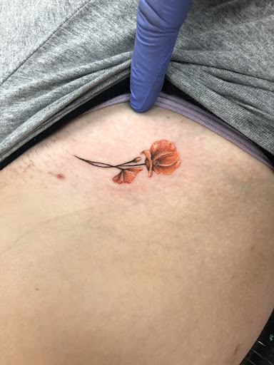 Explore tiger lily tattoo ideas, creative tattoo ideas in San Diego, available at Inkfinite Artistry