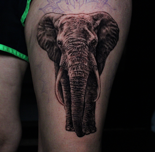 Explore mens back shoulder tattoo ideas, creative tattoo ideas in Addison, available at Cat Tattoo