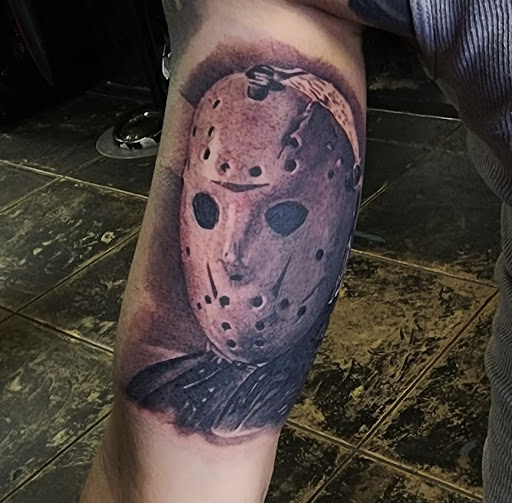 Explore cover up star tattoo ideas, creative tattoo ideas in Los Angeles, available at Reservoir Tattoo Studio
