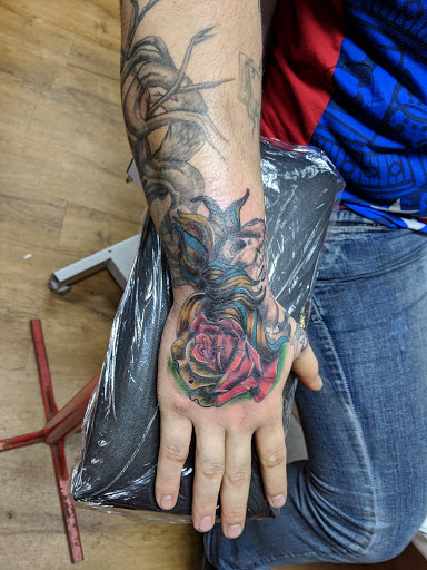Explore long thin tattoo ideas, creative tattoo ideas in Akron, available at Knuckle Up Ink Tattoos