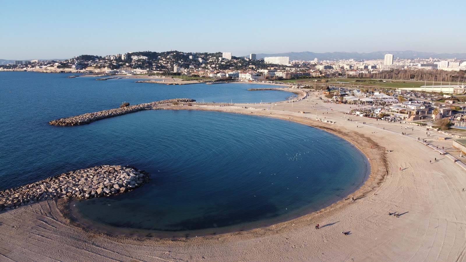 Fotografie cu Plajele Prado cu o suprafață de apa pură turcoaz