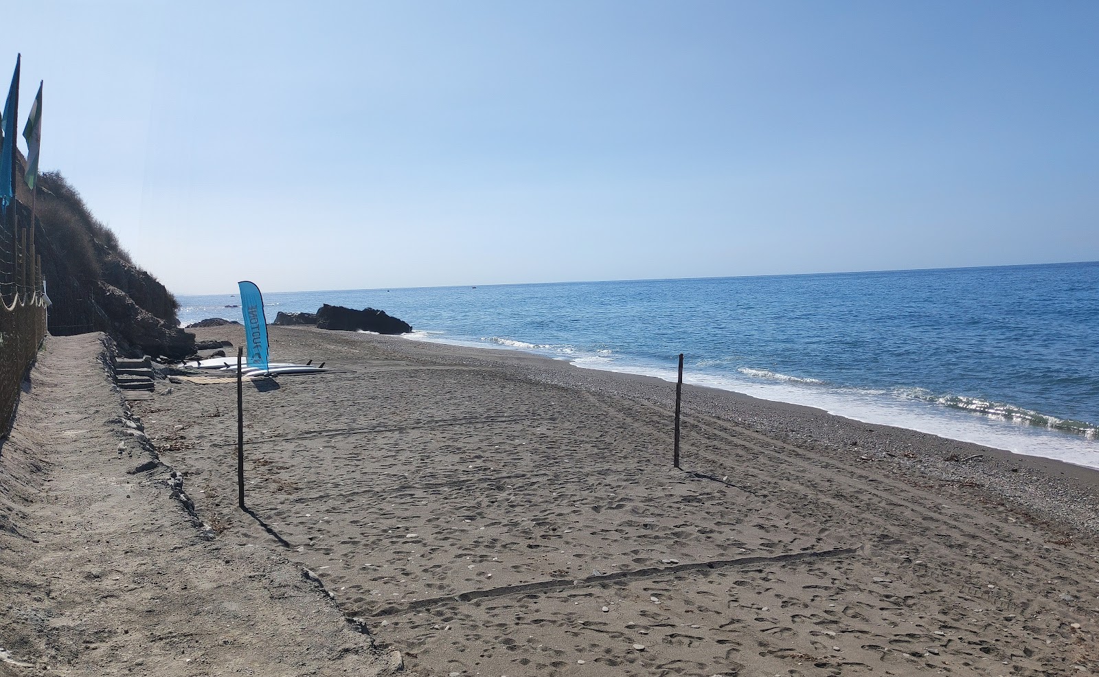 Photo de CalaJunco Beach avec un niveau de propreté de très propre