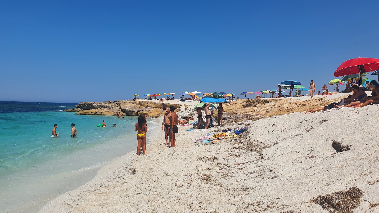 Foto van Spiaggia S'Archeddu - populaire plek onder ontspanningskenners