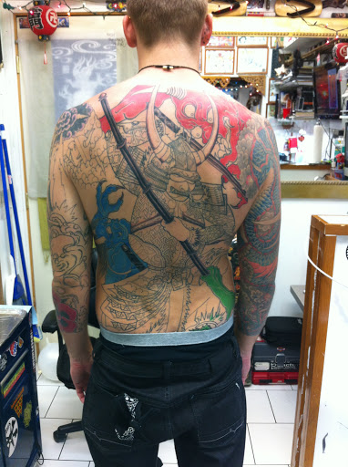 Explore photography tattoo ideas, creative tattoo ideas in Honolulu, available at 434 TATTOO WAIKIKI