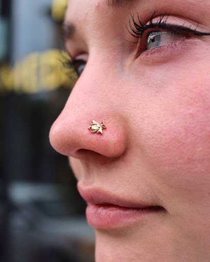 Explore spade tattoo ideas, creative tattoo ideas in Brooklyn, available at Ahimsa Piercing Studio & BVLA Fine Jewelry