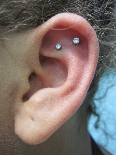 Explore crucifix tattoo ideas, creative tattoo ideas in Stafford, available at Virtue Tattoo