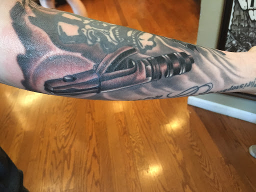 Find tiger tattoo ideas for your next unique tattoo in Lees Summit at Bleeding Heart Tattoo