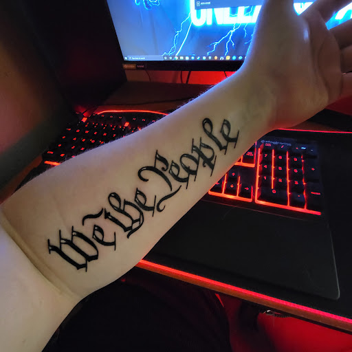 Tattoo Shop «In The Flesh Tattoo & Body Piercing», reviews and photos, 311 High Ave E, Oskaloosa, IA 52577, USA