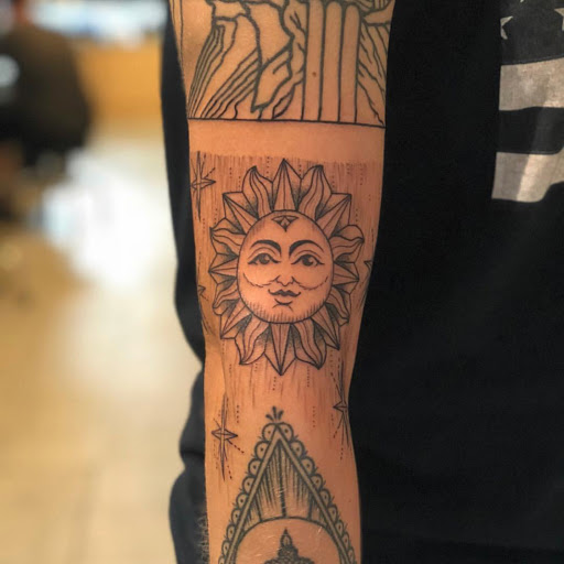 Explore crystal ball tattoo ideas, creative tattoo ideas in New York, available at Red Baron Ink Tattoo and Piercing