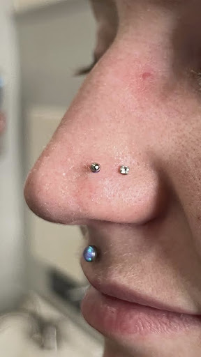 Explore matching tattoo ideas for husband and wife, creative tattoo ideas in Arlington, available at Benchmark Tattoos