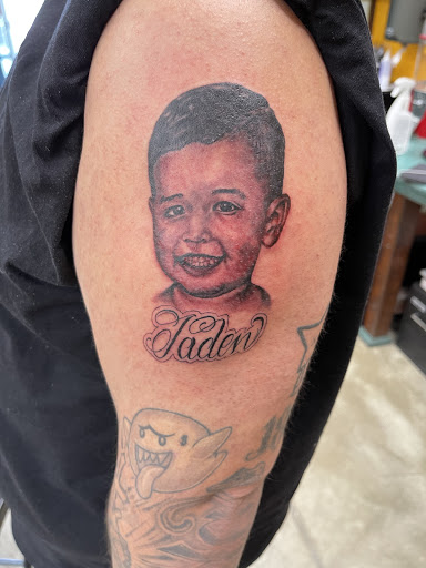 Explore tramp stamp cover up tattoo ideas, creative tattoo ideas in Fresno, available at True Anchor Tattooing