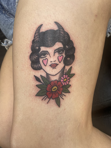 Explore hang loose tattoo ideas, creative tattoo ideas in Brandon, available at Pinup Tattoo Studio