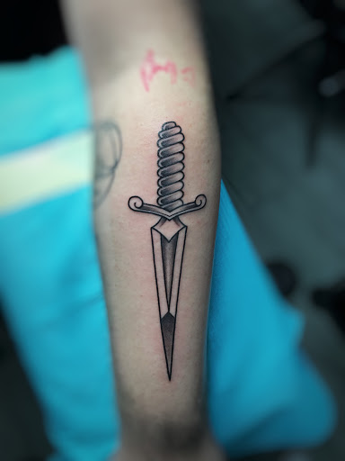 Explore tribal cross tattoo ideas, creative tattoo ideas in Carmel, available at Phong Tattoo