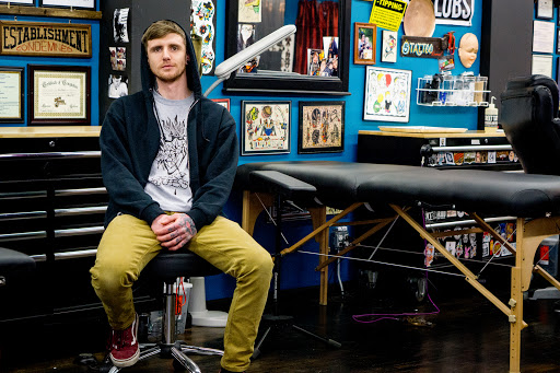 Find tattoo ideas for woman on leg for your next unique tattoo in Salem at State Street Tattoo