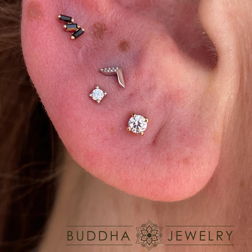 Explore women's forearm tattoo ideas, creative tattoo ideas in Dover, available at Agap Body Piercings