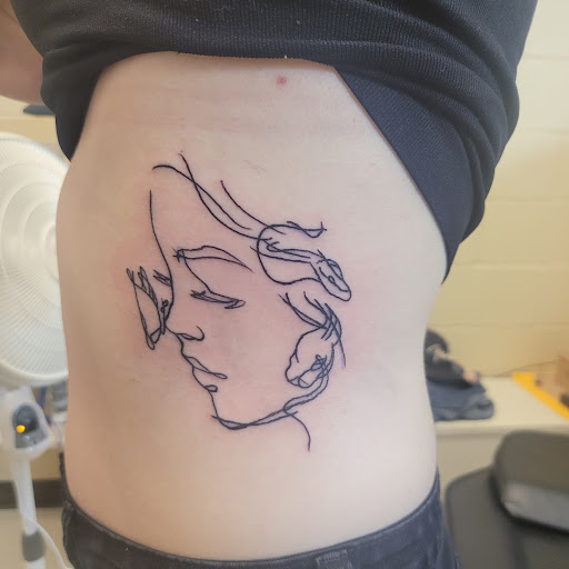 Explore dog sleeve tattoo ideas, creative tattoo ideas in Ozark, available at Tooth & Nail Tattoo & Piercing