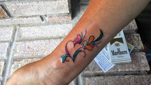 Explore tattoo ideas graffiti, creative tattoo ideas in Ormond Beach, available at Tropical Tattoo Inc