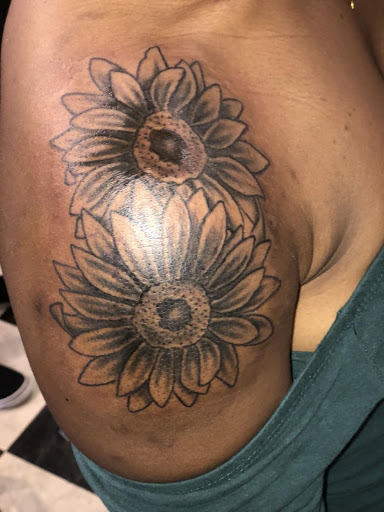 Explore hand name tattoo ideas, creative tattoo ideas in Augusta, available at Mr. Tattoo