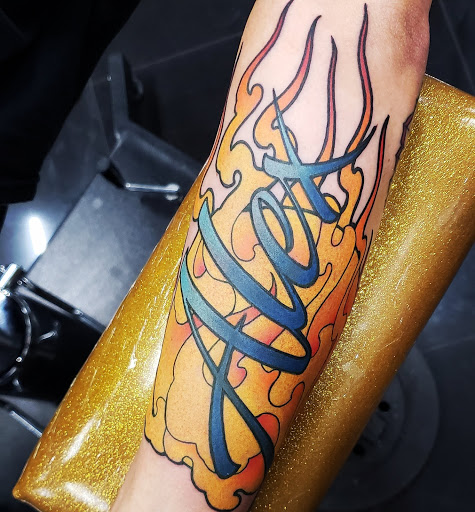 Explore tattoo ideas for men's shoulders, creative tattoo ideas in Addison, available at Cat Tattoo