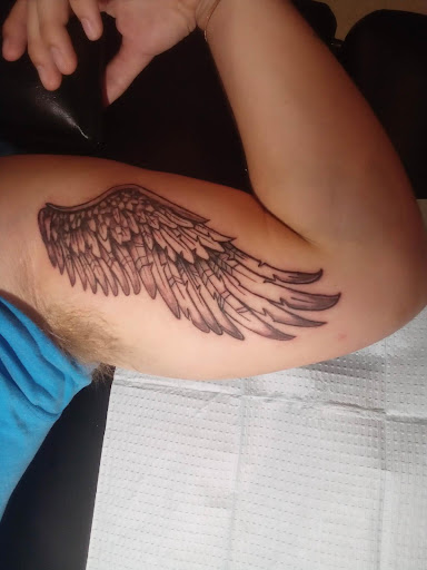 Find wave tattoo ideas for your next unique tattoo in Largo at Inside Ink Tattoo Studio