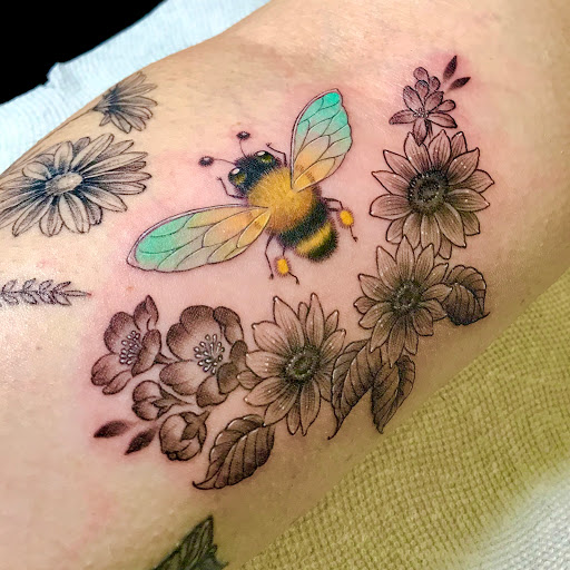 Explore great forearm tattoo ideas, creative tattoo ideas in Warrensburg, available at Altered Visions Tattoo Studio