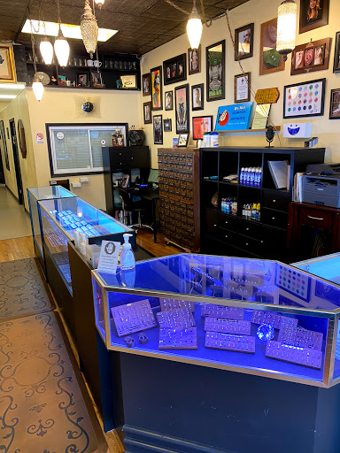 Explore hood neck tattoos ideas, creative tattoo ideas in Atlanta, available at Virtue and Vice Body Piercing