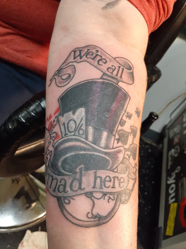 Explore mens knee tattoo ideas, creative tattoo ideas in Hamilton, available at A New Part of You Tattoos and Piercings