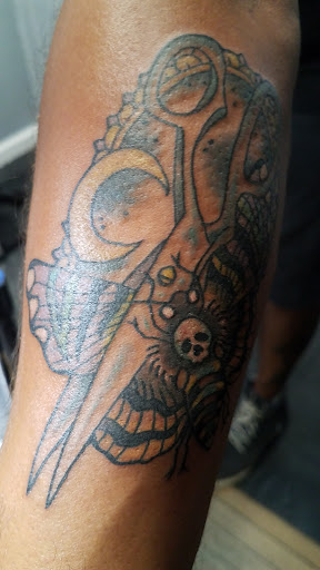 Explore small dog tattoo ideas, creative tattoo ideas in Yorktown, available at Army Navy Tattoo