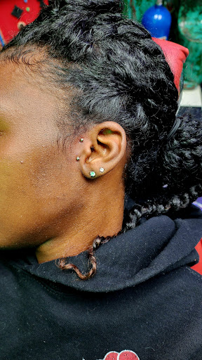 Explore boondocks tattoo ideas, creative tattoo ideas in Arlington, available at The Chosen One Ink