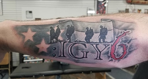 Explore crucifix tattoo ideas, creative tattoo ideas in Kearney, available at Babalus Professional Tattoo Studio