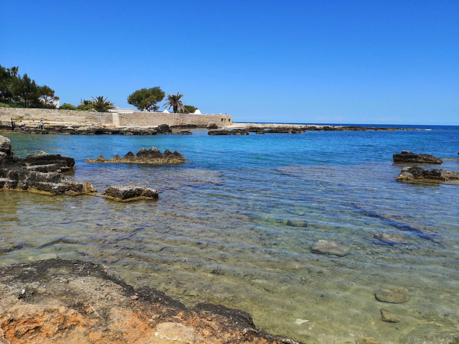 Fotografija Porto Cavallo beach z srednje stopnjo čistoče