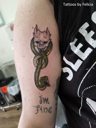 Find cat tattoo ideas small for your next unique tattoo in Fort Myers at Tiger Lotus Tattoo and Piercing