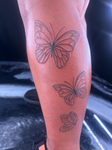 Explore thigh tattoos ideas for guys, creative tattoo ideas in Stuart, available at Kenny Tats Inkcorporated