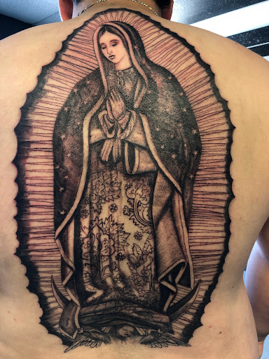 Explore forearm christian tattoo ideas, creative tattoo ideas in San Angelo, available at A1 Tattoos and Piercings