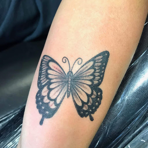Explore arm flower tattoo ideas, creative tattoo ideas in San Angelo, available at A1 Tattoos and Piercings