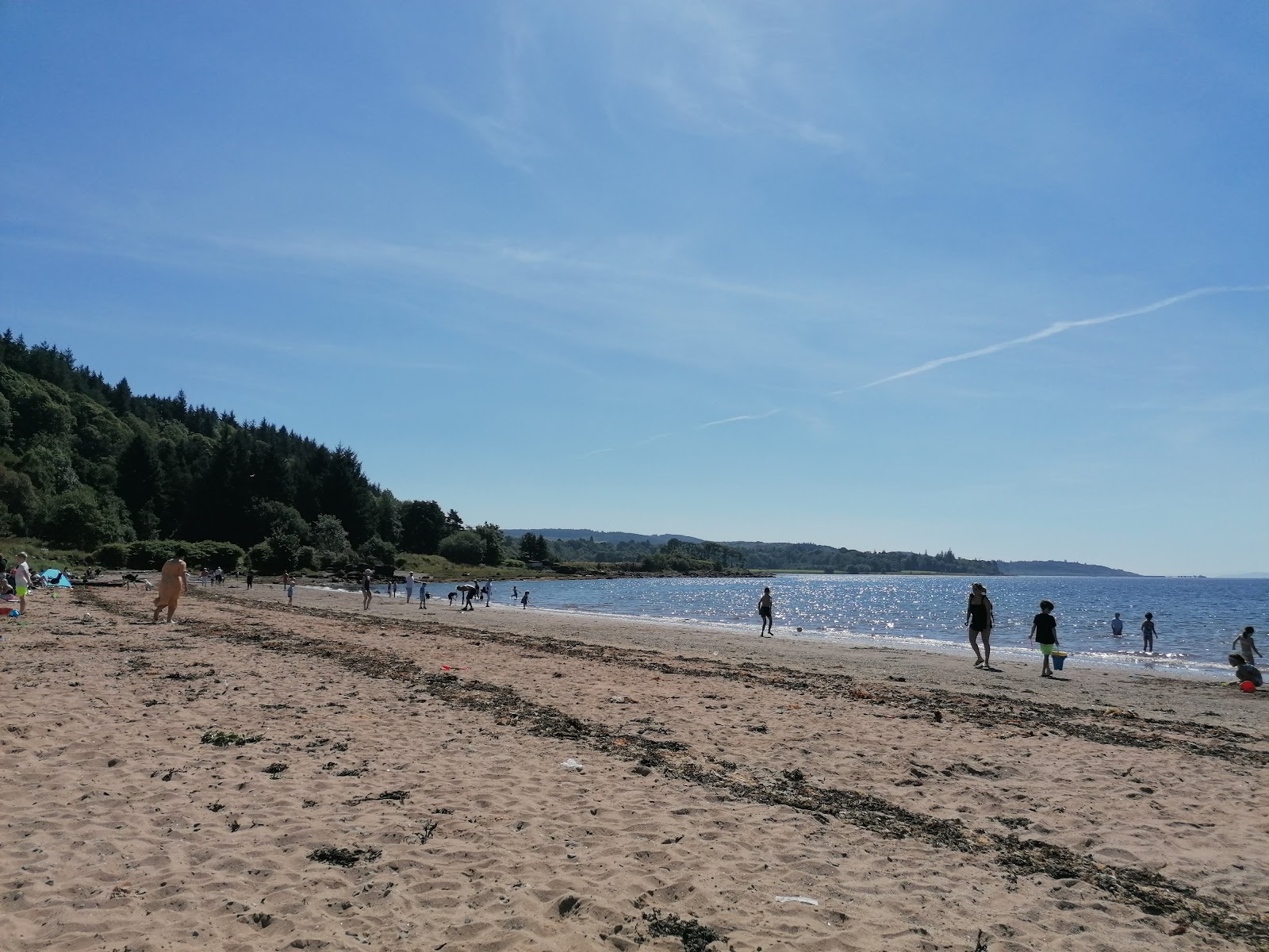 Photo of Lunderston Bay Beach with bright sand surface