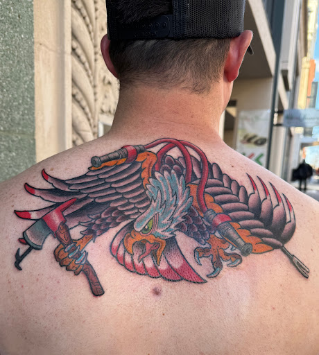 Explore armband tattoo ideas for men, creative tattoo ideas in Greensboro, available at Golden Spiral Studios