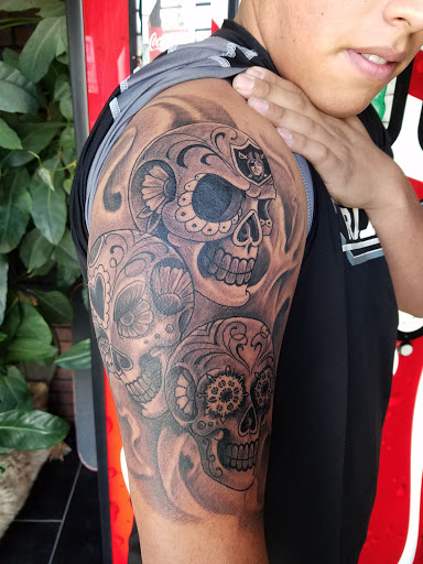 Explore tigger tattoo ideas, creative tattoo ideas in Albuquerque, available at Por Vida Tattoo