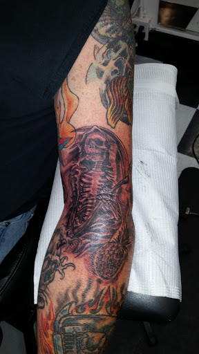 Explore cover up ideas for wrist tattoo, creative tattoo ideas in Nicholasville, available at Castle of Color