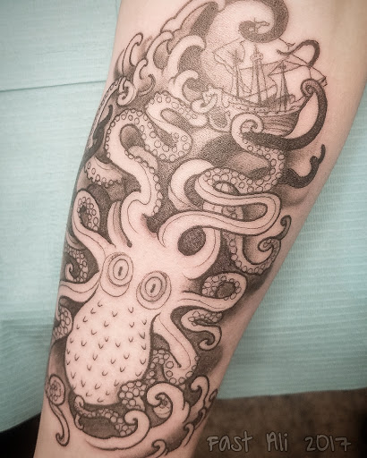 Explore dachshund tattoo ideas, creative tattoo ideas in Cranford, available at Lost & Found Tattoo Studio