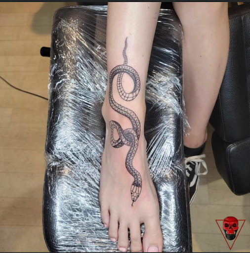 Explore light bulb tattoo ideas, creative tattoo ideas in Fort Wayne, available at Grade A Tattoos and Body Piercing