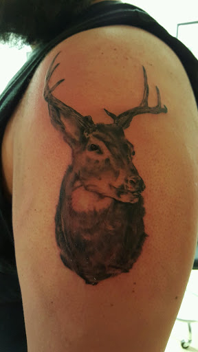 Tattoo Shop «magnum opus tattoo company», reviews and photos, 1817 Padre Blvd #4, South Padre Island, TX 78597, USA