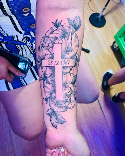 Explore tattoo ideas for behind ear, creative tattoo ideas in Gautier, available at Voodoo Tattoo