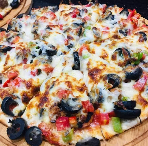 مطعم العجينة المستديرة 