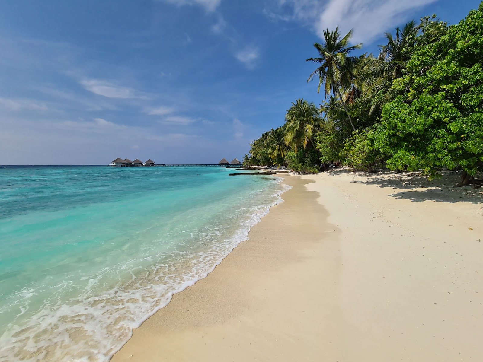 Foto av Adaaran Club Rannalhi med vit fin sand yta