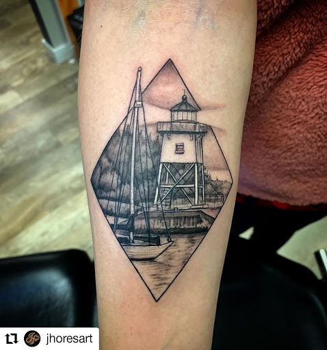 Explore feminine cross tattoo ideas, creative tattoo ideas in Rochester, available at Sacred Heart Studios