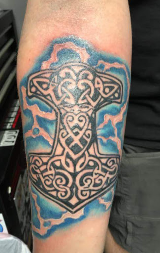 Explore knee tattoo ideas for men, creative tattoo ideas in Murfreesboro, available at Middle Tennessee Tattoo Co.