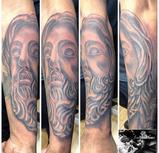 Explore mirrored tattoo ideas, creative tattoo ideas in Newark, available at Bad Intentionz Tattoo & Piercings Studio