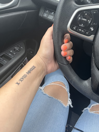 Find cardinal tattoo ideas for ladies for your next unique tattoo in Fontana at Iconiq Tattoo Studio