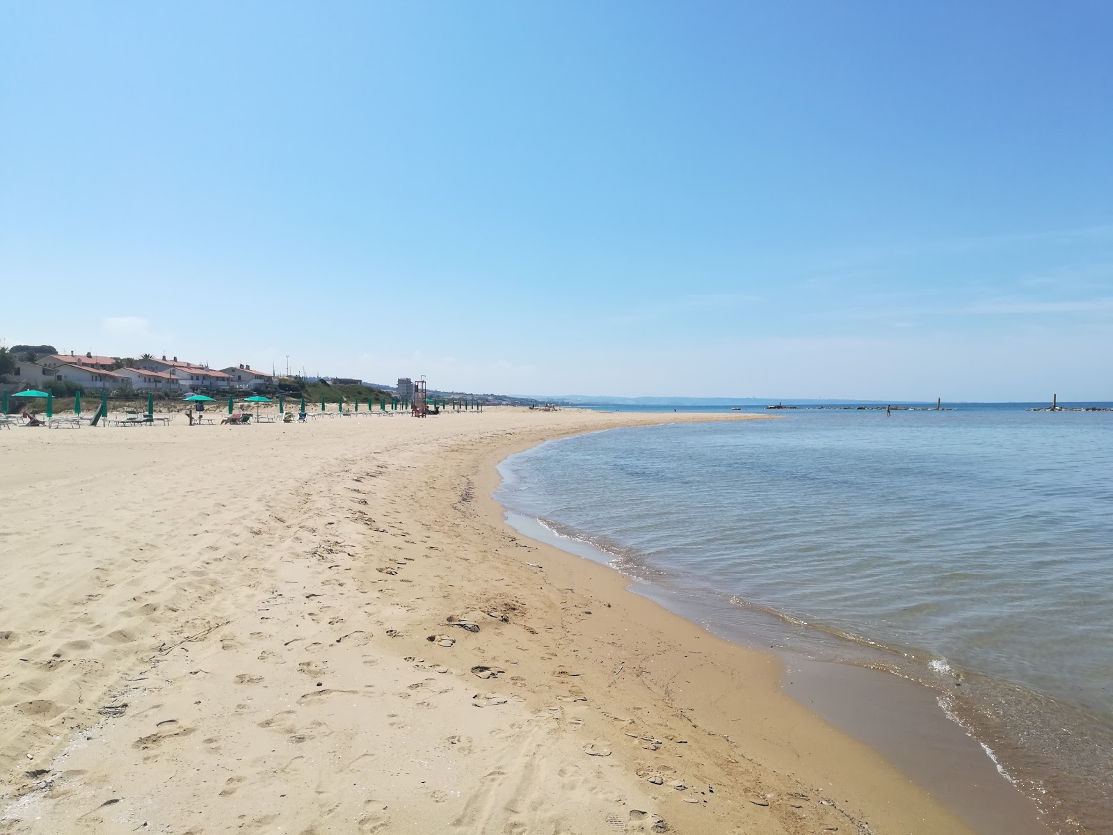 Zdjęcie Spiaggia del Litorale Nord z powierzchnią brązowy piasek